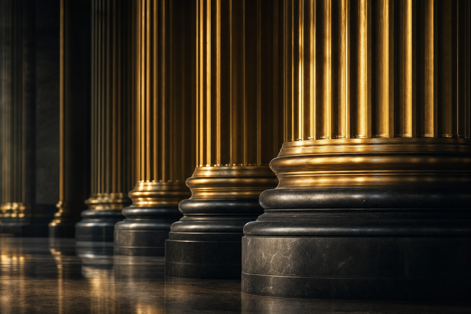Architectural detail of brass and stone columns evoking institutional banking